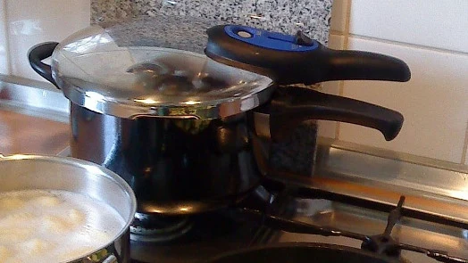 Pressure cooker on stove